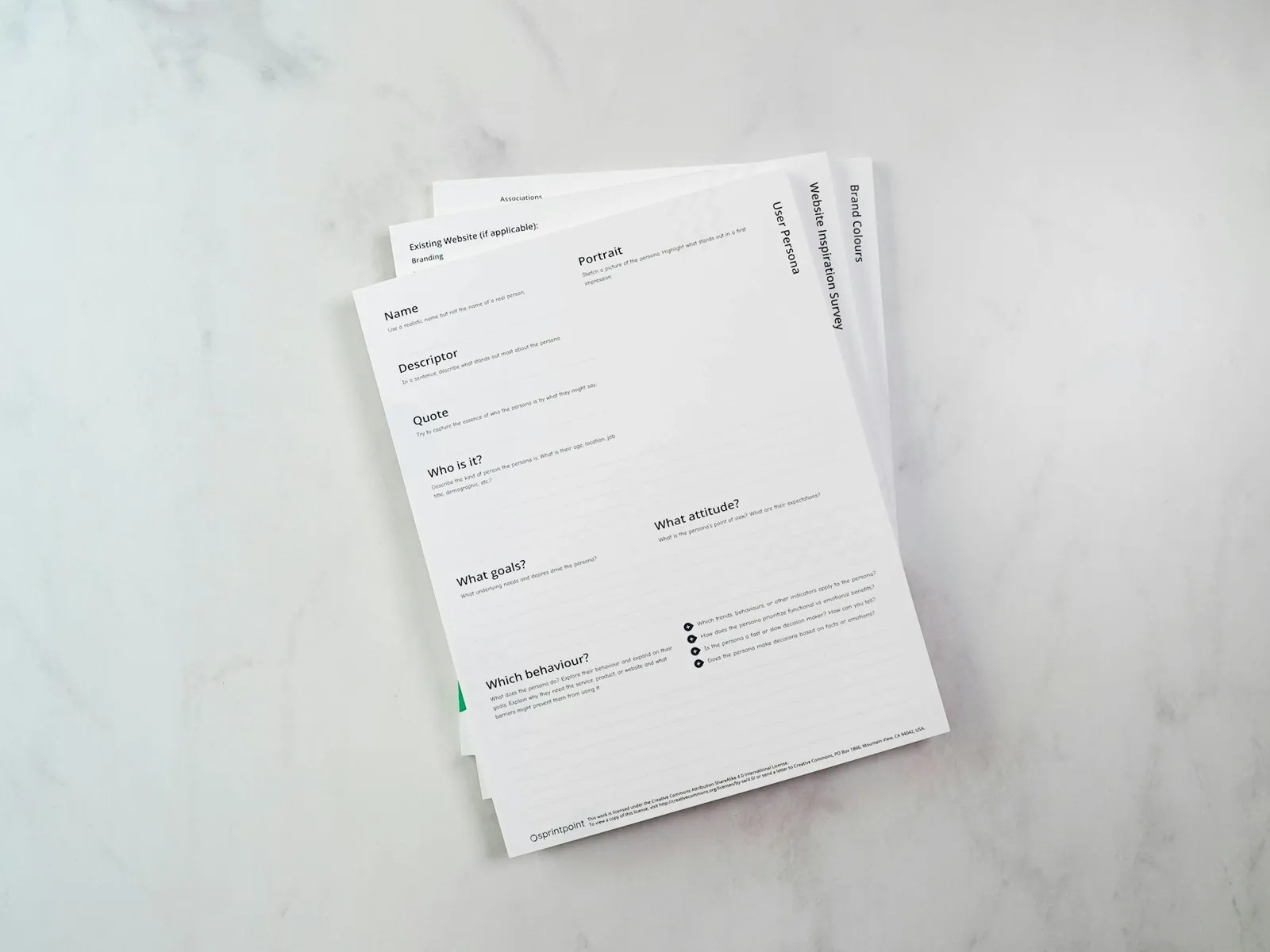 A printed form lying flat on a pale surface, seen from above.